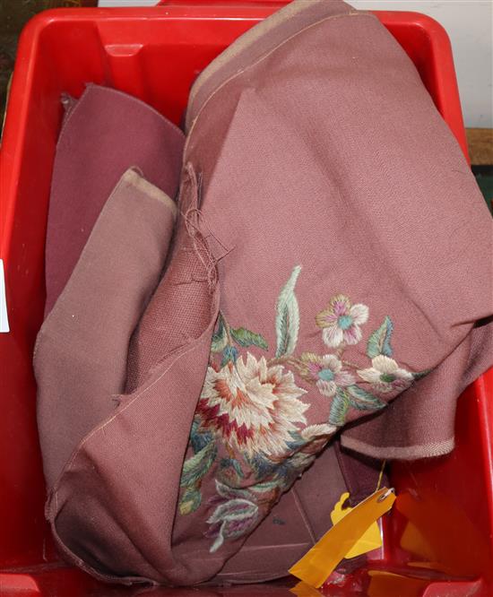 A collection of crewel work cushion covers